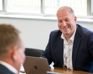 Rob Longden in a meeting